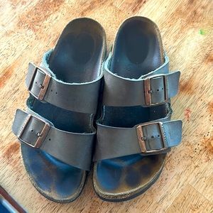 Birkenstocks deep taupe with rose gold hardware size 38 (women’s size 7)